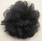 sifon buatan hitam dan mesh korsase bunga buatan dengan pin